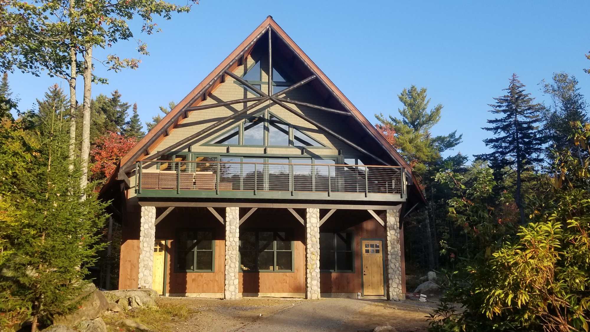 The Barn, its timber front and tall windows