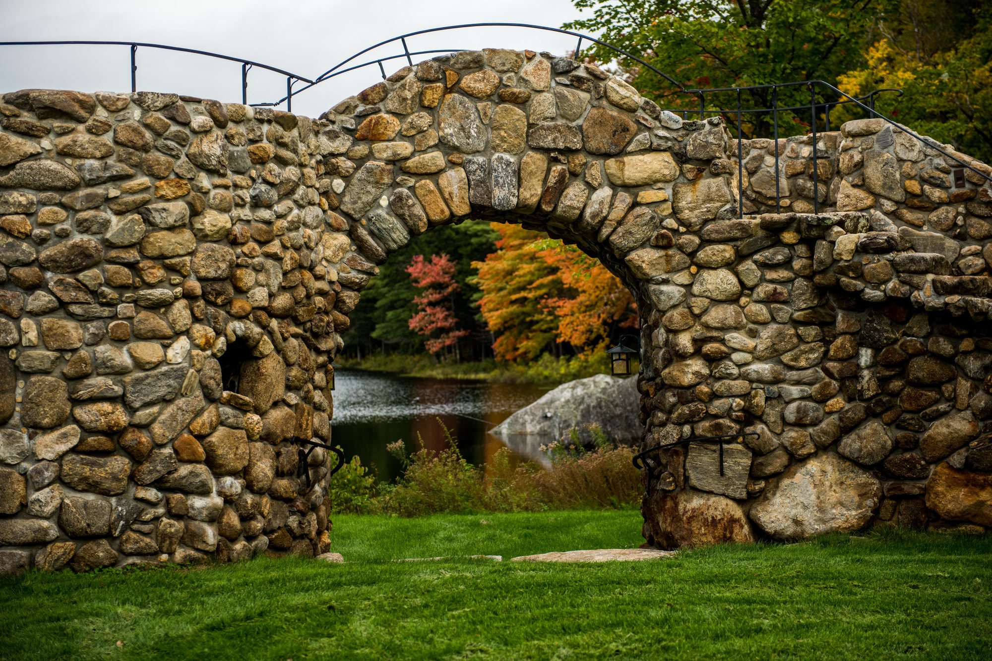 The Walled Garden arches with the pond behind
