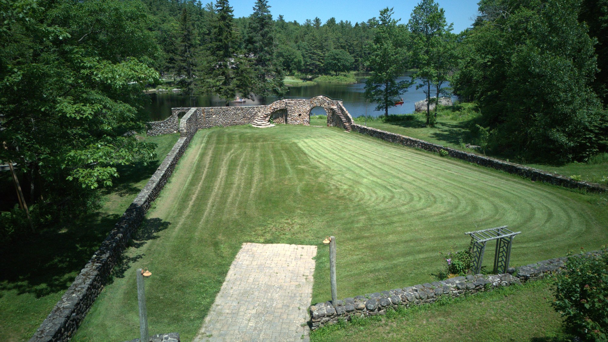 The Walled Garden lawn with the pond beyond