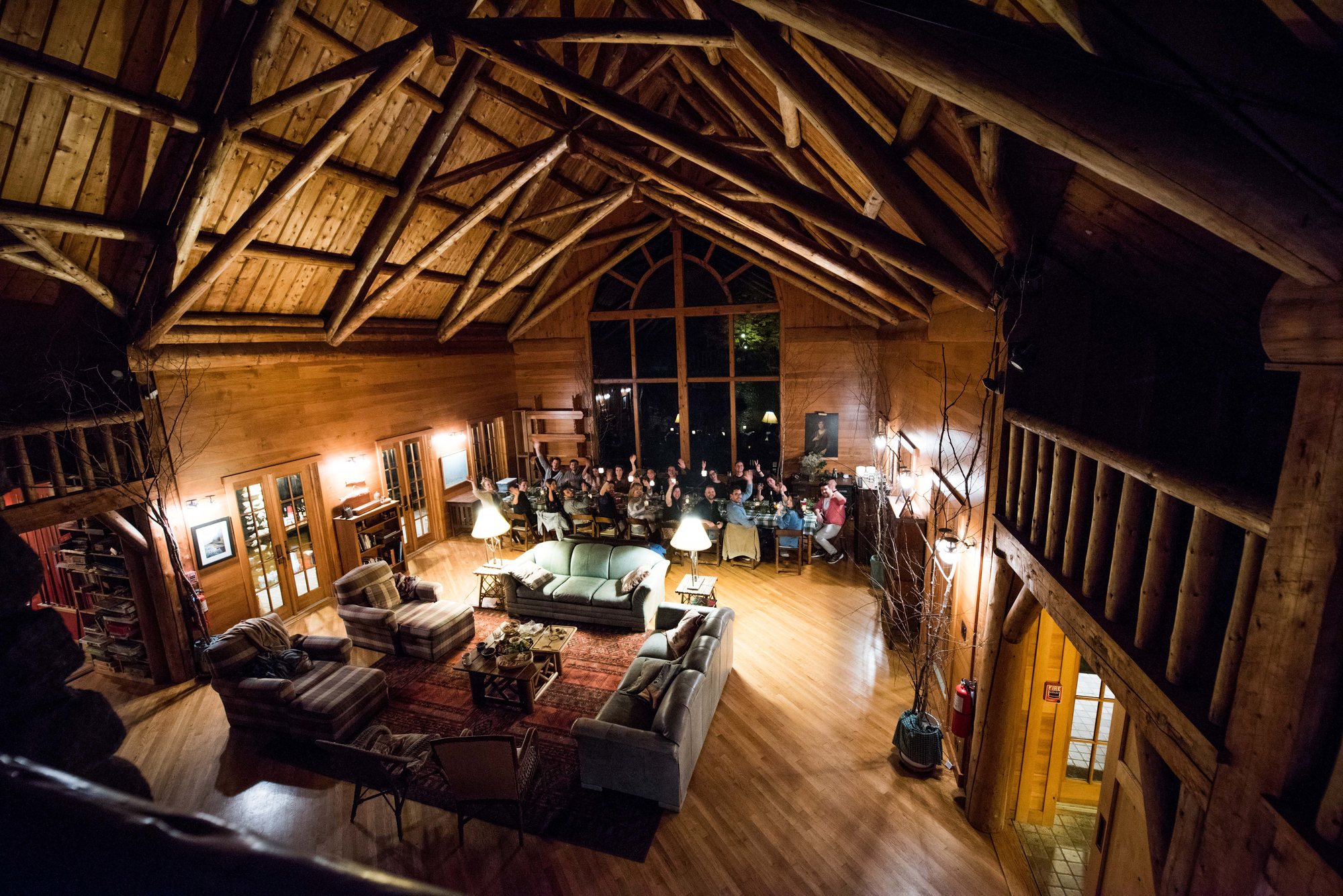 A gathering in the Great Room seen from the balcony