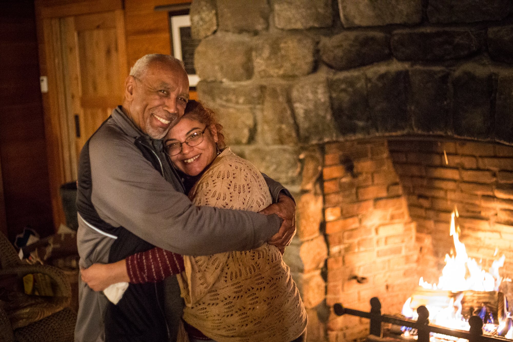 An embrace by the fire in the Lodge