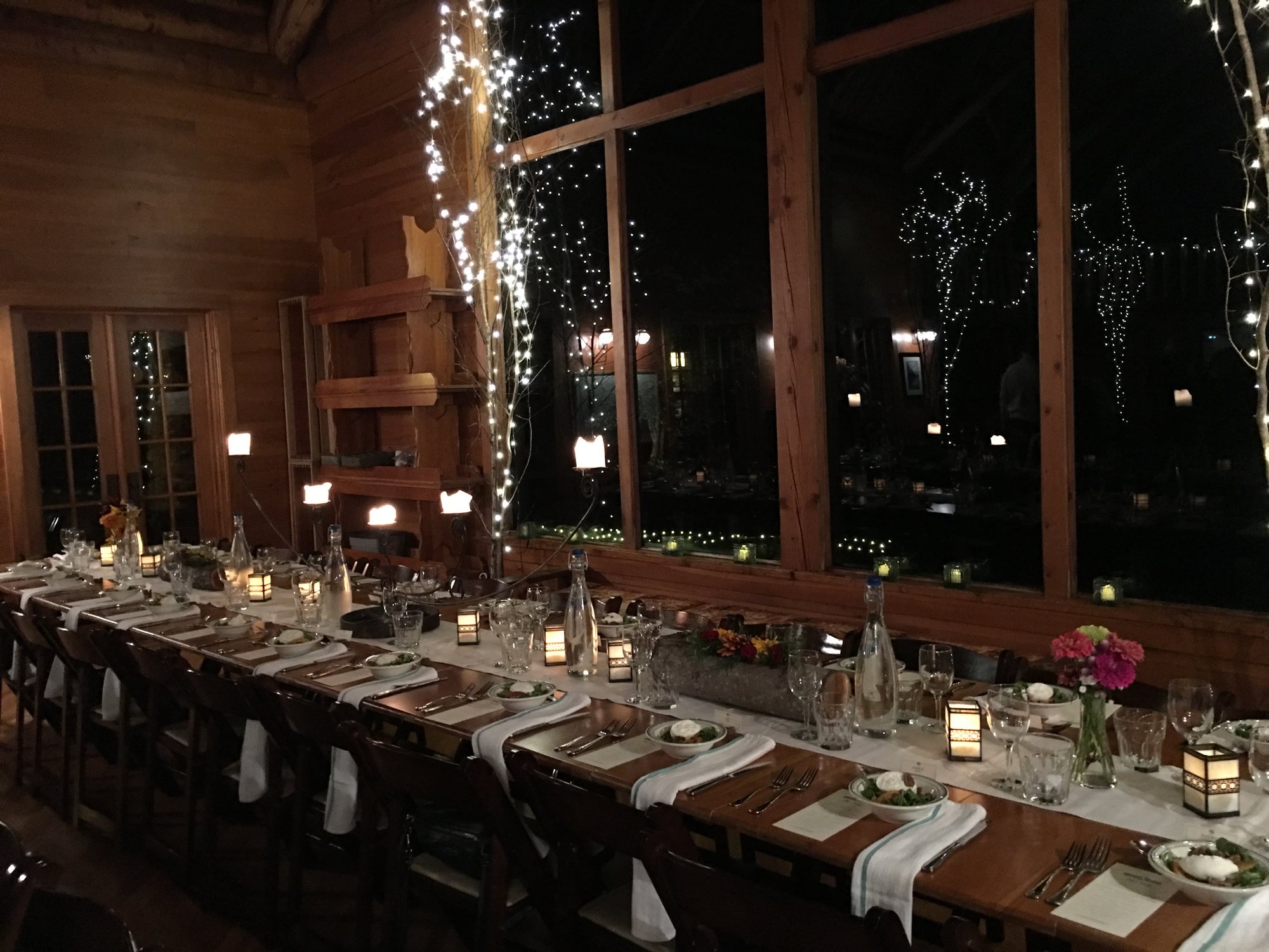 A long table set for dinner in the Lodge