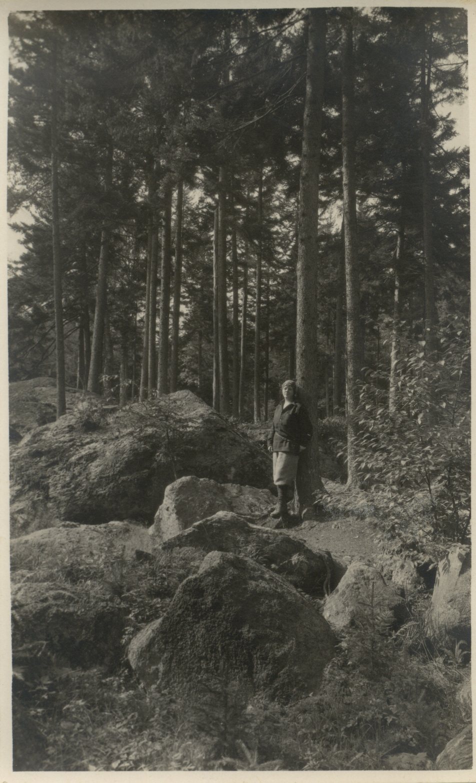 Florence Brooks Aten in the woods by the dam