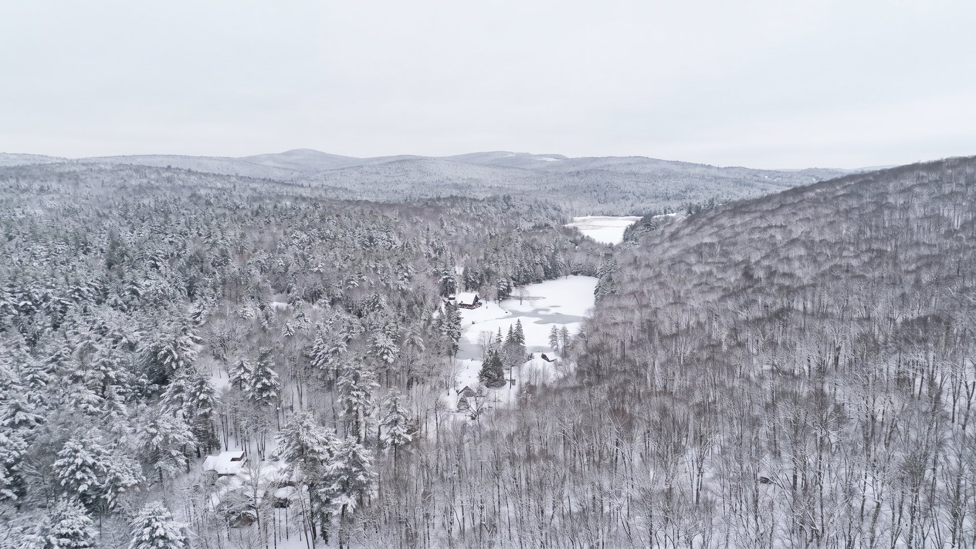 The same view under snow, an illustration made from the summer photograph