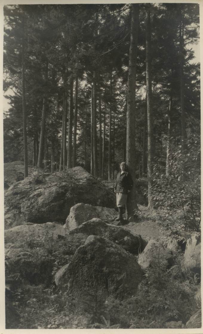 Florence Brooks Aten in the woods by the dam